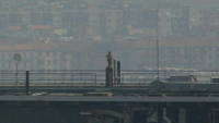 La madonnina sul tetto del pirellone fotografata da palazzo lombardia
